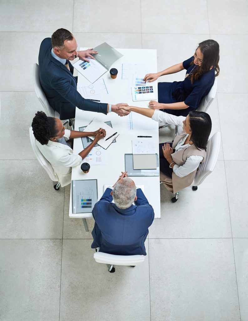 High angle shot of businesspeople having a meeting in a modern office.
